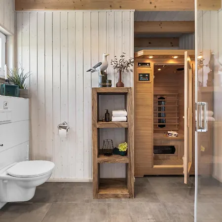 Dom wakacyjny Strandlodge - Direkt Am Weidefelderstrand Mit Sauna Und Kamin Olpenitz